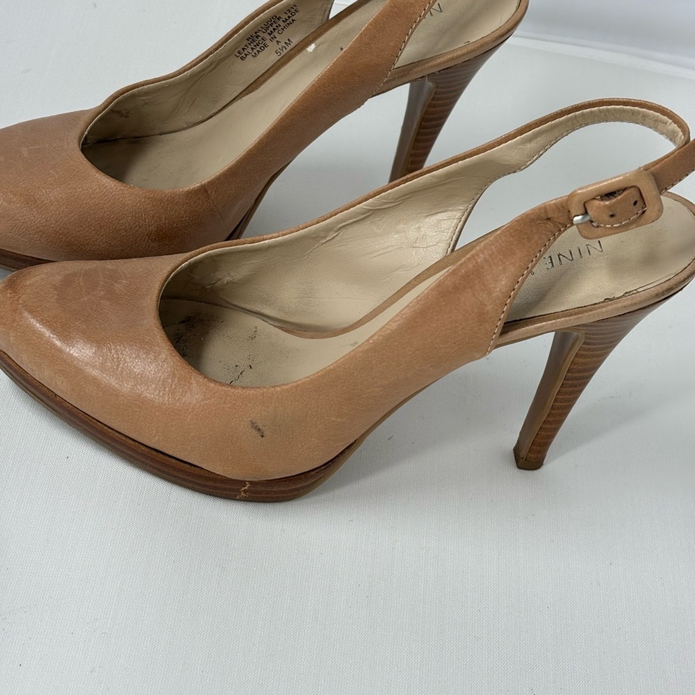 Tan strappy heels from Nine West. 5.5M